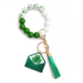 Green and white silicone bead keychain bracelet with St. Patrick's Day clover charms - US 1