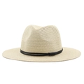 Detail of fine straw weaving and black decorative band on a summer Panama hat - Beige