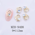 Macro de 5 bijoux d'ongles en cœur doré avec texte Love et zircons holographiques - Zirconia Aurore Pierre de Lune Blanche sur Base Dorée (9408 Pierre de Lune Blanche)