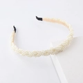 Elegant woven faux pearl headband with gold metal frame and black comfort tips - Braided Pearl (Pearl White)