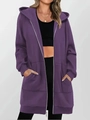 Close-up of purple longline zip-up hoodie featuring large pockets and adjustable hood - Purple