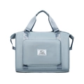 Light blue foldable travel bag for sports with durable nylon and Guomi brand label - Blue