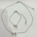 Parure bijoux argentée comprenant un collier et un bracelet à pendentif cœur et ovale - Lettre O Style (5610) / Argent