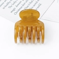 Minimalist brown plastic hair claw clip for girls with a smooth finish on white background - PC Material / Glossy Transparent Yellow
