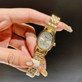 Elegant gold oval quartz watch for women with a minimalist metallic link chain strap - Gold Band White Dial
