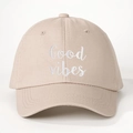 Beige cotton baseball cap with white Good Vibes embroidery on a clean white background - Light Khaki