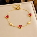 Gold stainless steel heart bracelet featuring vibrant red zircon heart-shaped charms - Red Heart Pendant Style (B1775)