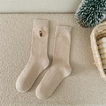 Beige Christmas bear embroidery speckled knit socks in warm winter home setting - Khaki