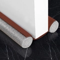 Brown double-sided door draft stopper with foam tubes installed on a white door - Bag Packaging / Brown