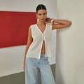 French hollow knit vest in white featuring V-neckline and decorative buttons - S / White