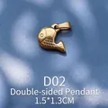 Detailed close-up of a 1.5x1.3CM double-sided gold fish pendant with realistic scales - Gold Whale (D02)