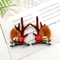 Christmas reindeer horn hair clips with brown ears and red berries on book - Coffee Bell