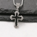 Close-up of a silver cross pendant with black square gemstones and micro-pave crystals - Black / Box Chain 60cm