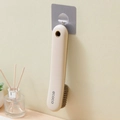 Wall-mounted soft bristle shoe brush in beige with grey bristles and hanging hook - Shoe Brush / Cream