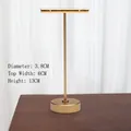 Golden T-shaped metal earring display stand with circular base and minimalist design - Flat Oval Base Large / Gold