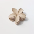 Macro shot of 8cm cream-colored matte flower hair claw with durable resin spring - Matte Beige Coffee