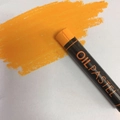 Vibrant orange oil pastel crayon with smooth strokes on white paper surface - Orange