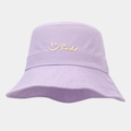 Detail view of the embroidered Smile text and wink icon on a purple summer bucket hat - One Size / Light Purple