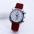 Detail view of square quartz watch with red silicone strap and silver metal case finish - Wine Red Silver Case