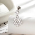 Silver snowflake ear stud with zircon pendant on a soft white curved background - Dangle Snowflake (A996-2)