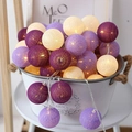 Decorative LED cotton ball string lights in purple and cream for cozy room ambiance - Battery Model: 5 Meters 50 Lights / Purple