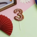 Chocolate brown donut-themed birthday candle shaped like number 3 with colorful sprinkles - Number 3 - Chocolate Donut