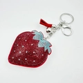 Detail of strawberry keychain with red rhinestones and leather tassel on silver clasp - Wine Red with Lake Blue