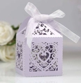 Detail of lavender laser-cut heart candy box with elegant white ribbon for wedding gifts - Light Purple