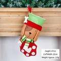 Festive large Christmas dog stocking with white bone tag and paw print motif, 47cm height - Good Dog Pet Christmas Stocking