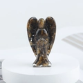 Handmade resin angel figurine with natural tiger eye crystal stones on white stand - Tiger's Eye