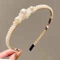 Children's headband featuring elegant white pearls on a slim golden alloy frame - Style 9 Three Pearl Crown