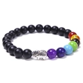 Close-up of seven chakra beaded bracelet featuring matte black stones and silver elephant - Matte Stone Bracelet