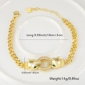 Macro shot of gold leopard bracelet with green zircon eyes and clear crystal details - White Rhinestone Style (款式一)