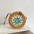Round rattan crossbody bag featuring teal floral shell inlay and brown leather strap - Snow Lotus