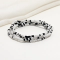 Close-up of double-layered black and white seed bead chain on soft white fabric - 80cm / Black/White