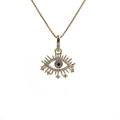 Minimalistische goldene Evil Eye Halskette mit Zirkoniasteinen auf weißem Grund - Böses Auge / Gold