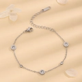 Bracciale in acciaio argento con ciondoli a numeri romani e pietre di zircone lucide - Argento