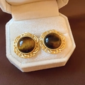 Macro view of 18k gold plated tiger eye hoop earrings in a white velvet jewelry box - 9# Gold Hollow Round Stud Earrings (9#)