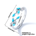 Leaf-shaped open ring featuring sky blue marquise stones and silver branch detail - Silver Tone With Deep Blue Zirconia