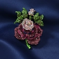 Elegant rose brooch with pink and green rhinestones on dark blue silk background - Purple