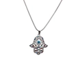 Macro detail of silver Hamsa hand pendant with blue evil eye and colorful gemstones - Silver Hamsa Hand Evil Eye