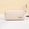 Große beige Kosmetiktasche aus PU-Leder mit vertikalen Nähten und Reißverschluss - Beige