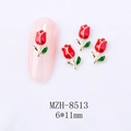 Detailed view of 6x11mm red tulip nail charms with gold trim and green leaves - Red Tulip Gold Base (8513)