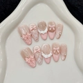 Rosa Katzenaugen-Press-on-Nägel mit 3D-Schleifen und Perlen auf weißem Teller - XS / 405-Mandelform