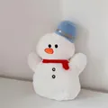 Close-up of plush snowman toy with red scarf and blue hat showing soft texture - Blue Hat Snowman