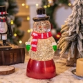 Festive Christmas snowman crystal ball music box decoration with glitter and red base - Red Base Snowman