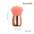 Rose gold nail dust brush with pink bristles, measuring 8.7cm in height and 3.9cm in width - Rose Gold Mushroom Makeup Brush