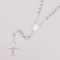 Detailed view of silver stainless steel rosary beads with a central oval medal and cross - Silver