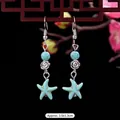 Bohemian starfish earrings with turquoise beads and silver flower accents - 24-Small Flower Starfish