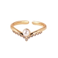 Detail of V-shaped gold ring featuring a central white pearl and micro-pave zircons - V-Shape Pearl Style